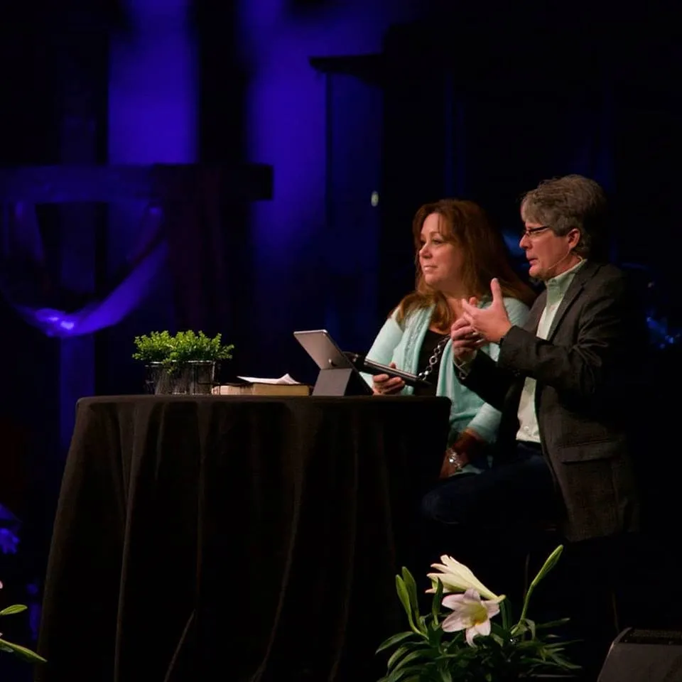 Pastor Rick and Beckee on stage discussing how to hear God's voice.